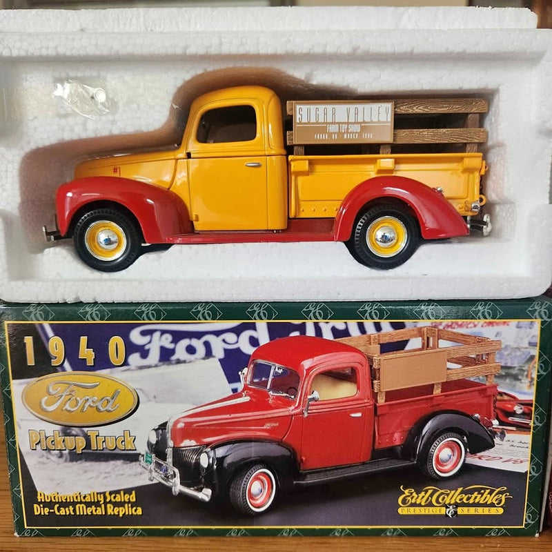 Yellow vintage diecast pickup truck with red wheels, detailed cab and open bed