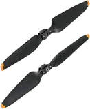 Drone propellers with black blades and orange tips, with mounting hubs, quick-release set