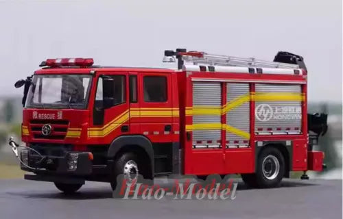 Red alloy diecast fire engine model with front cab and ladder
