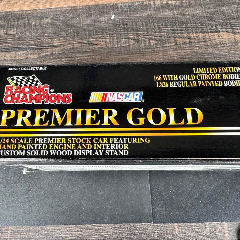 NASCAR Premier Gold 1:24 diecast car bank in retail box, limited edition