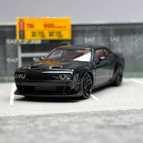 1/64 black diecast model car with front grille and hood vents, angled view