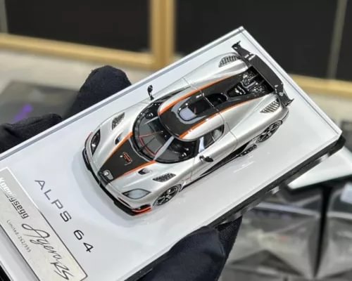 Silver Agera RS diecast racing model car with open interior, in display box
