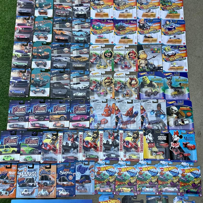 Hot Wheels diecast car blister pack assortment with character figures