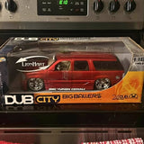 Red 1:18 die-cast pickup truck in clear Dub City Big Ballers display box