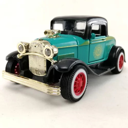 Teal and black vintage diecast coupe model car, red wheels, front-left view