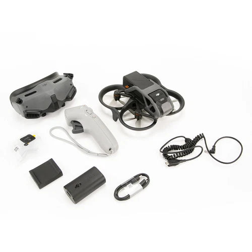 FPV drone and goggles kit with controller, cables, and batteries
