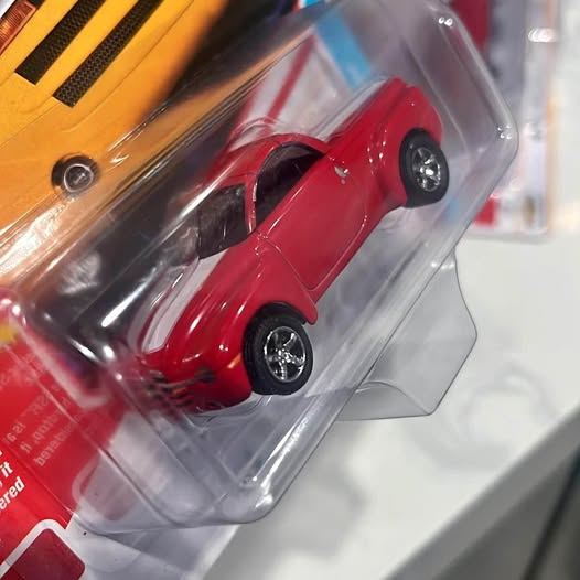 Red die-cast Mission TX truck in clear blister pack