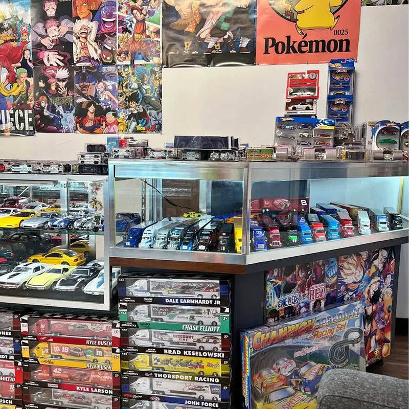 Diecast cars display case with multiple model cars on stacked shelves