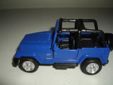 Blue diecast Jeep CJ7 model with black roll bars and tires