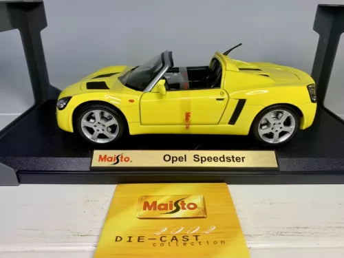 Yellow die-cast model car, Opel Speedster, open-top side view