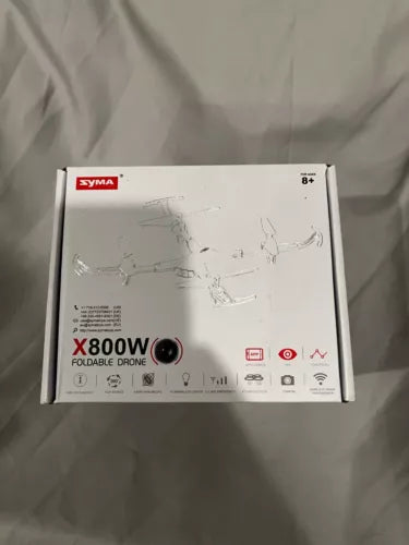 Syma foldable drone retail box showing X800W quadcopter and remote control