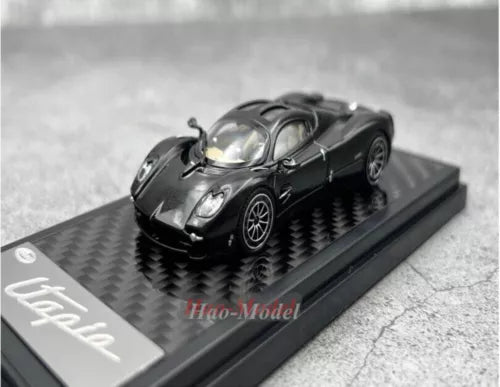 Black Pagani Utopia alloy diecast car model on display base