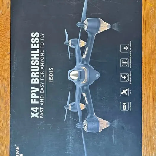 FPV brushless quadcopter drone illustration on box packaging