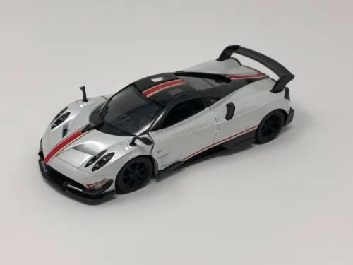 Diecast toy car in white with black wheels and racing decals, front 3/4 view