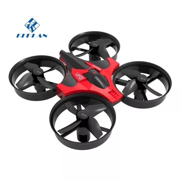 Micro quadcopter drone with four black propellers, red body, compact design