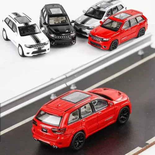 Red alloy SUV diecast car model with detailed grille, headlights, and windows
