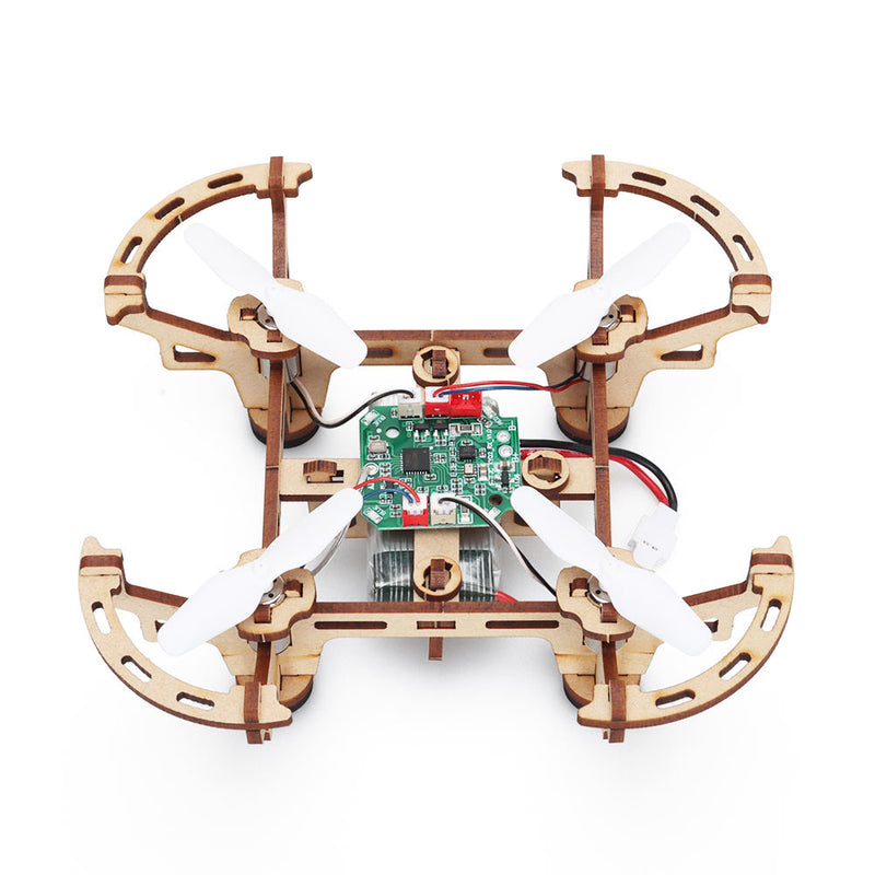 Wooden DIY 3D drone kit with circuit board and four propellers