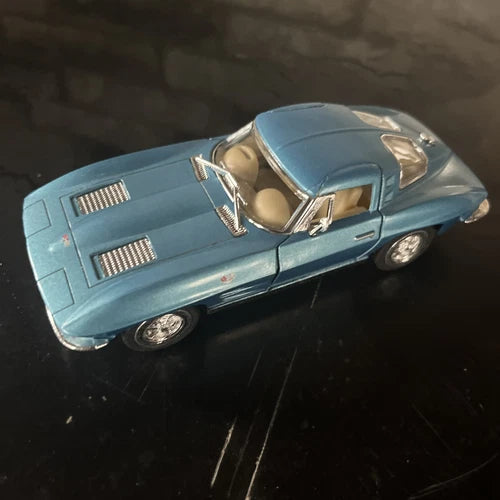 Blue 1963 Corvette Stingray diecast model car, 1:36 scale, chrome details