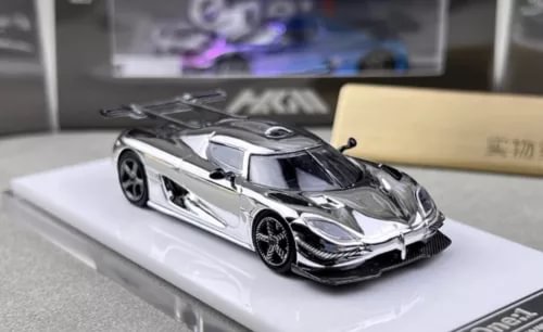Electroplated silver racing diecast car model with black accents