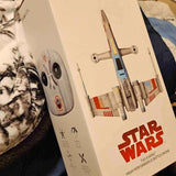 Star Wars T-65 X-Wing quadcopter battle drone product box with illustrated drone