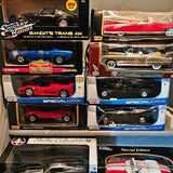 Diecast car multi-pack in retail boxes with blue, red, black cars