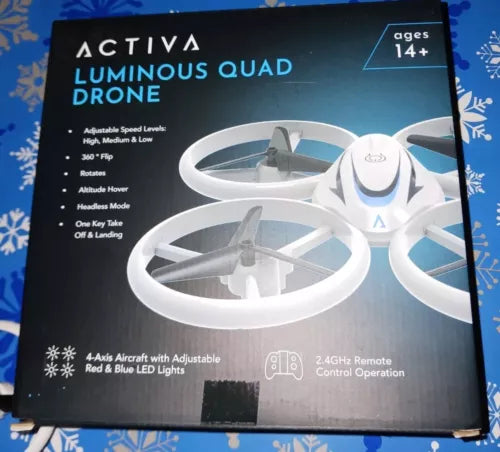 Luminous quadcopter drone with white body, red and blue LED lights, remote control