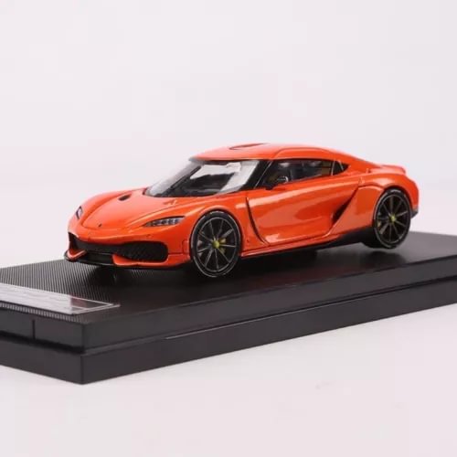 Orange diecast sports car model with black detailing and low-profile tires