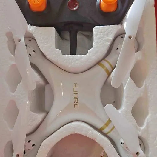 White drone frame with four arms and central body