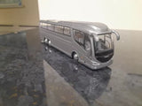 Grey diecast bus/coach model, front 3/4 view with detailed grille and headlights