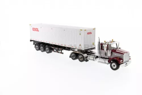 Maroon and grey day cab tandem tractor with white box trailer