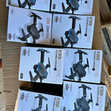 Set of 4K drone retail boxes with printed drone illustrations, blue and black