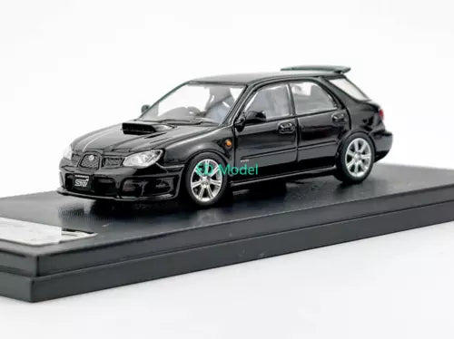 Black 1:64 diecast model car with chrome wheels on display base