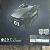Grey drone with front camera module and foldable arms
