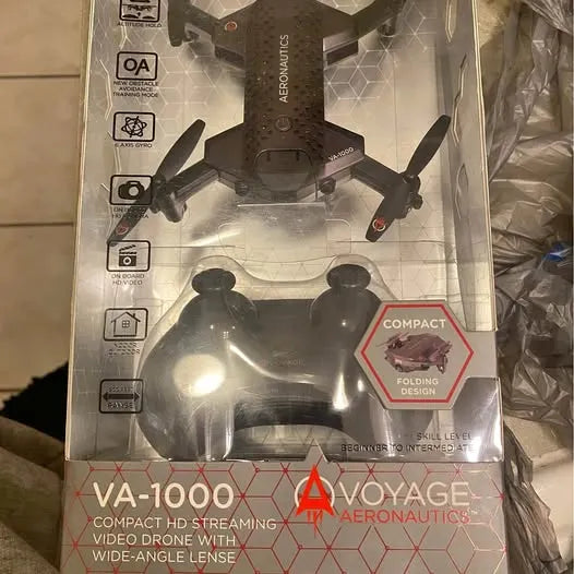 Compact folding HD streaming drone with wide-angle lens, shown in retail box