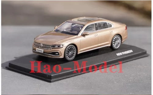 1:43 diecast sedan model car, beige, on black display base