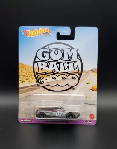 Hot Wheels 1:64 diecast race car in sealed blister pack, black and grey