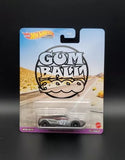 Hot Wheels 1:64 diecast race car in sealed blister pack, black and grey