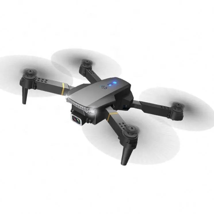 Mini foldable quadcopter drone with four rotors, front camera, and blue status light
