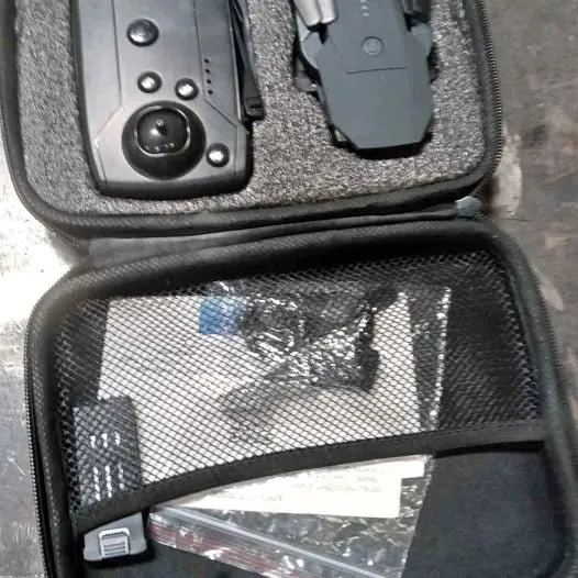 Drone camera carrying case with mesh pocket and clear plastic window
