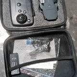 Drone camera carrying case with mesh pocket and clear plastic window