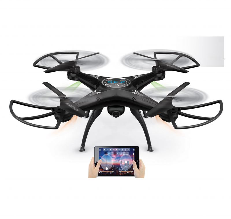 Small black quadcopter drone with four propeller arms and camera; tablet controller visible