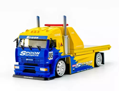 Yellow and blue diecast flatbed tow truck model, blue cab with number 95, metal toy
