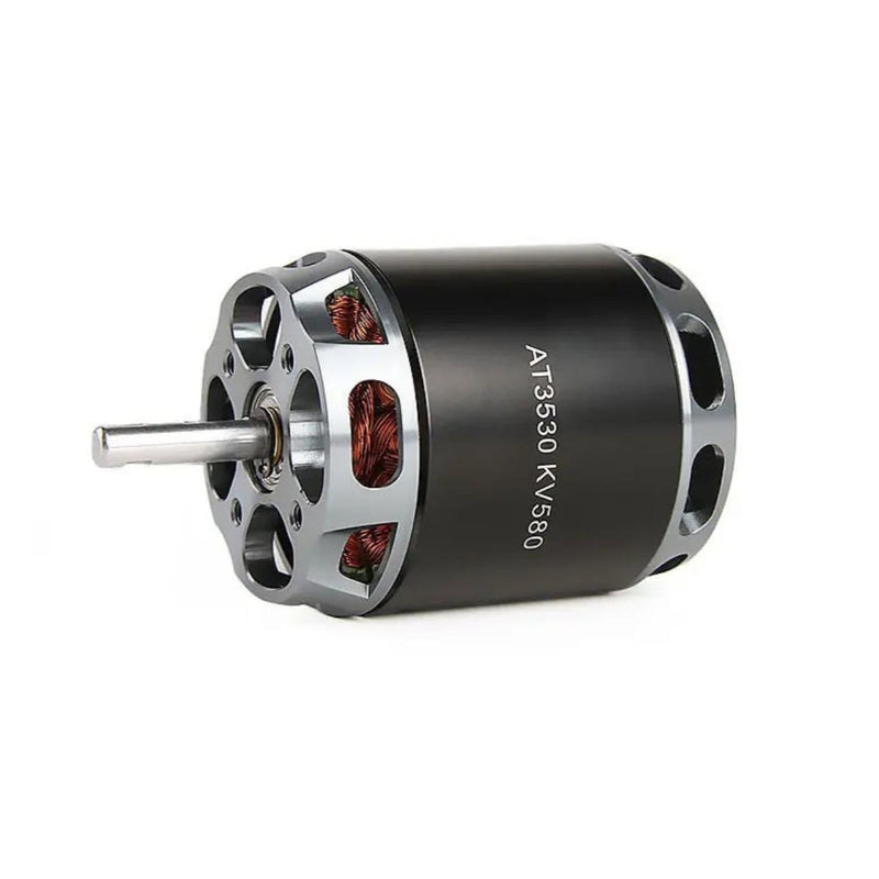 Brushless permanent magnet motor with shaft, mounting holes, and AT3530 KV580 marking