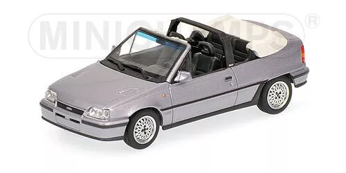 Silver diecast convertible car with black interior, front three-quarter view