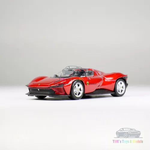 Bburago red Ferrari Daytona SP3 1/64 diecast model car, front 3/4 view