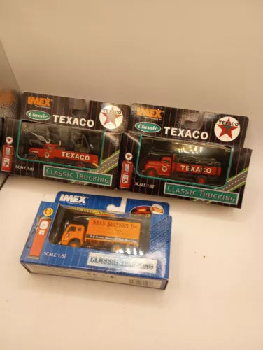 Die-cast Texaco tow truck in box, orange and red with green IMEX labels