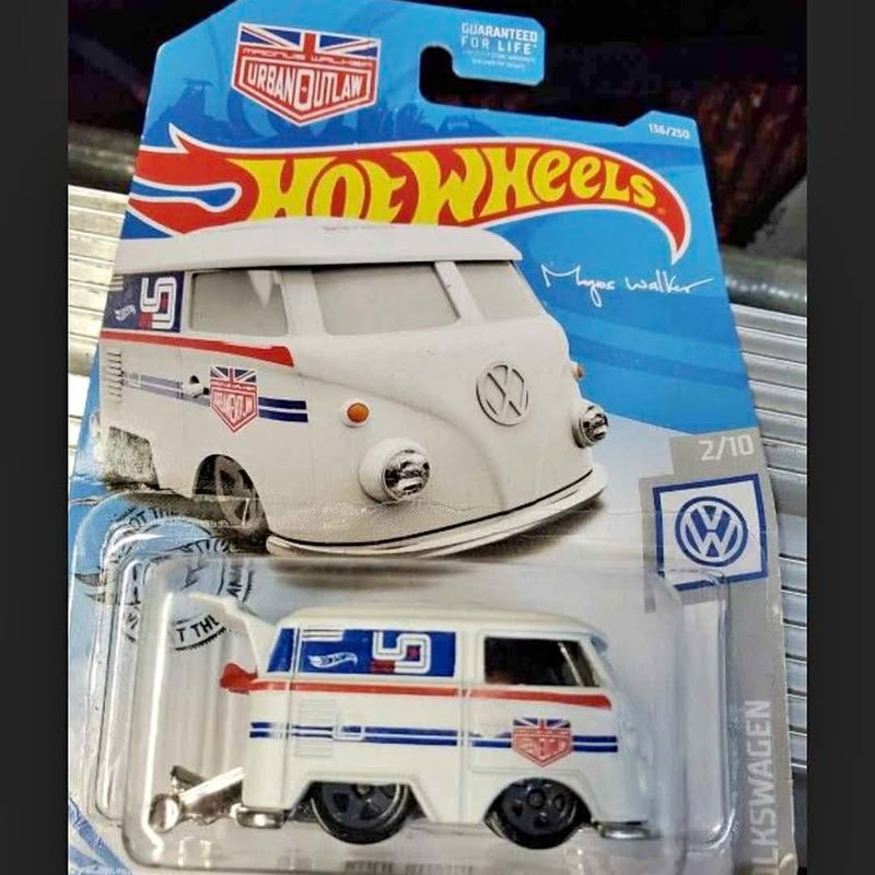White diecast Volkswagen Type 2 bus in retail blister packaging