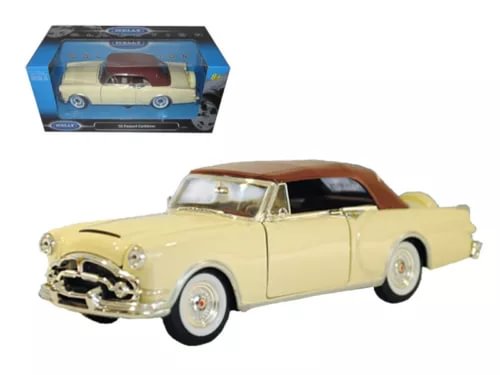 1/24 diecast classic car model, cream body with brown soft top, front 3/4 view