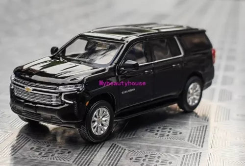 Black full-size SUV diecast model car with detailed grille and chrome wheels