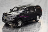 Black full-size SUV diecast model car with detailed grille and chrome wheels